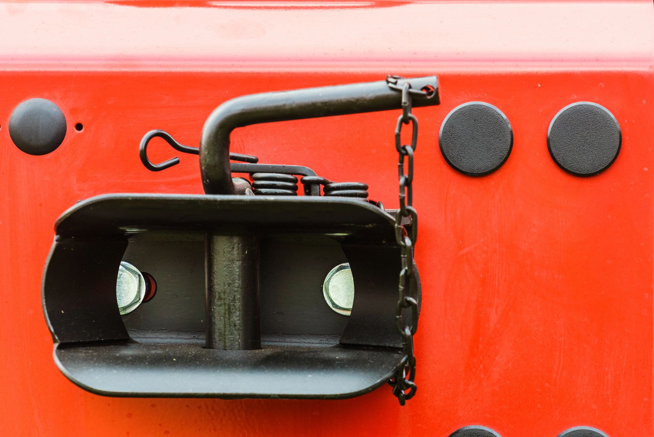 Close-up of a trailer latch pin and hook